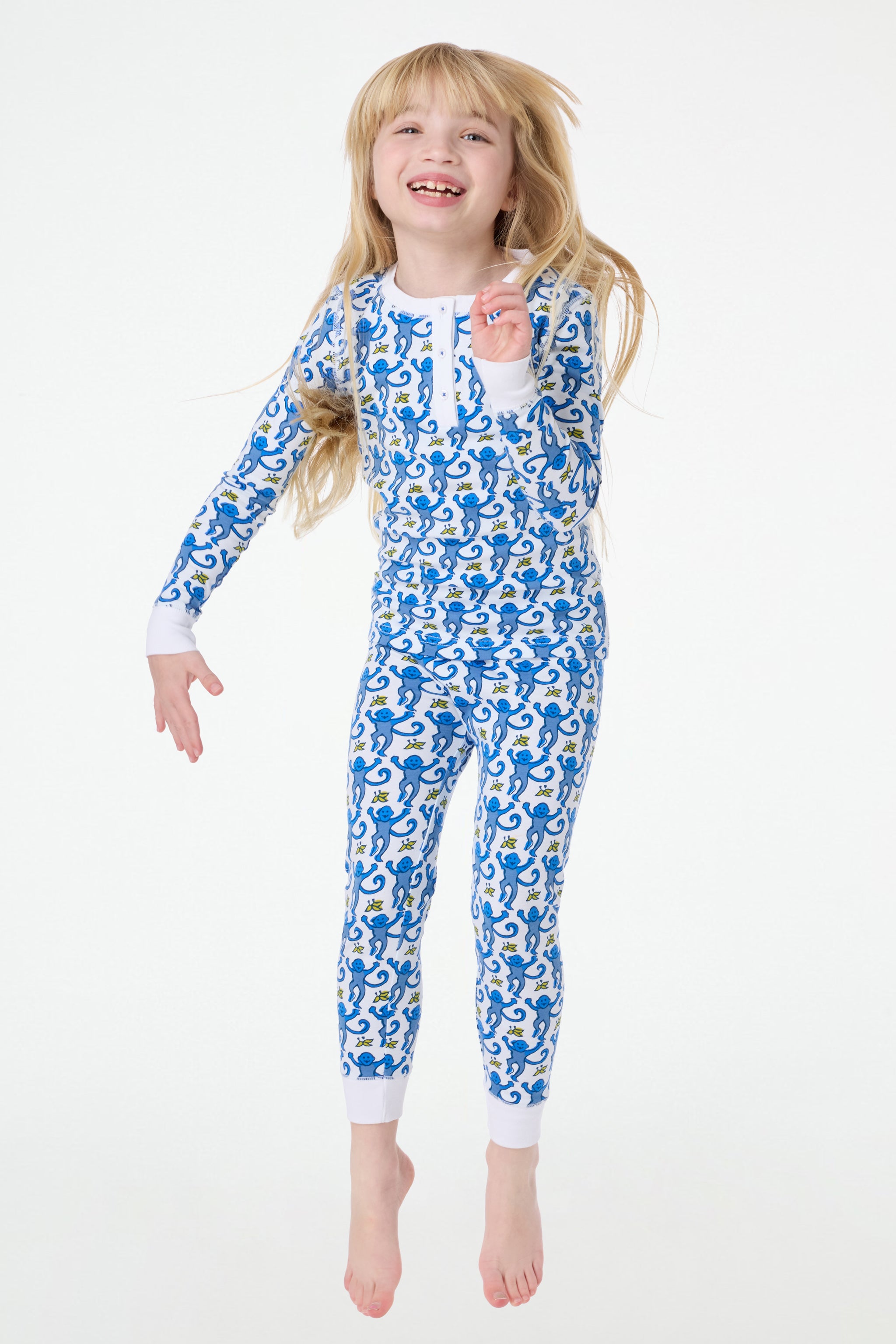 Teenager with Rollers in her Hair Wearing One-Piece Footed Pajamas