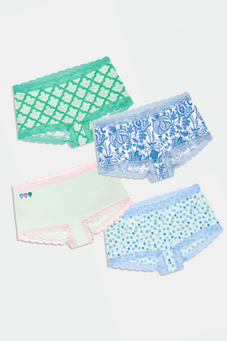 Four pairs of colorful underwear on a white background