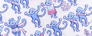 A repeating pattern on a white background featuring blue cartoon monkeys, some wearing sailor outfits or Delta Gamma shirts, with pink Big and Little sashes, anchors, and floral accents.