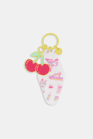 Rectangular Assorted Mystery Box keychain package with a repeating purple heart pattern and text reading Roller Rabbit Mystery Box surrounded by a border of dots.