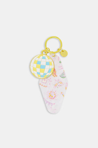 Rectangular Assorted Mystery Box keychain package with a repeating purple heart pattern and text reading Roller Rabbit Mystery Box surrounded by a border of dots.