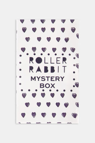 Rectangular Assorted Mystery Box keychain package with a repeating purple heart pattern and text reading Roller Rabbit Mystery Box surrounded by a border of dots.