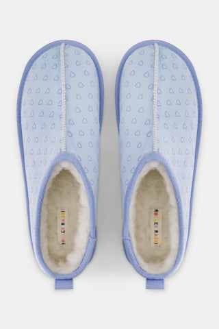 Light blue LUHE Hearts Fuzzy Clogs with a repeating heart pattern and a warm lining.