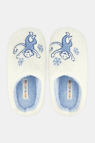 Snowflake Monkey Fuzzy Slippers in cream-colored fuzzy fabric with blue embroidered snowflakes, a blue interior lining, and light-colored outsoles.