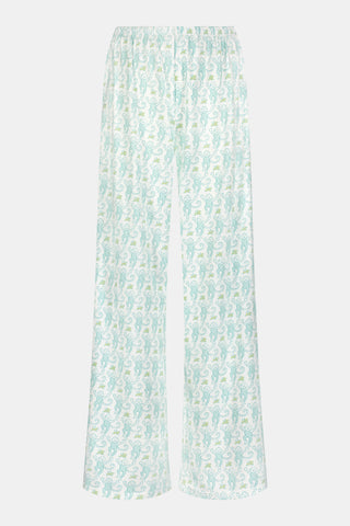 Wearing Roller Rabbit’s Monkey Monroe Pant in light blue and white heart-print cotton modal, the barefoot person stands against a white background, with only their lower torso and legs visible.