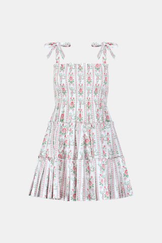 Sleeveless Monkey Block Stripe Ribbon Charlotte Nap Dress by Roller Rabbit, featuring shoulder tie straps, a smocked bodice, and crafted from striped fabric with colorful block patterns.