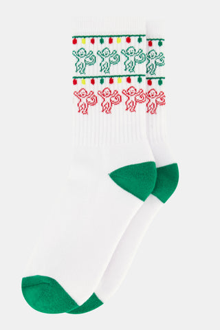 STREETSMART Deck The Halls Crew Socks are white holiday socks with green heels and toes, featuring a pattern of dancing gingerbread men and colorful light strings around the upper cuffs.