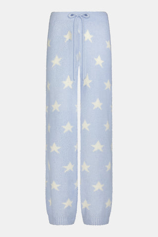 Stars Lettie Pant light blue plush loungewear pants featuring a white star print and a drawstring waistband.