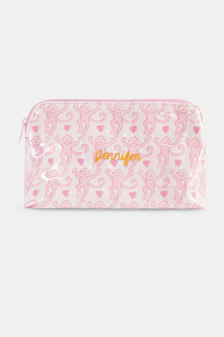 The Lovely Monkey Makeup Bag is a white cotton canvas pouch with a zipper, featuring pink monkeys with curled tails and tiny hearts. Water-resistant, cute, and practical—perfect for everyday use.