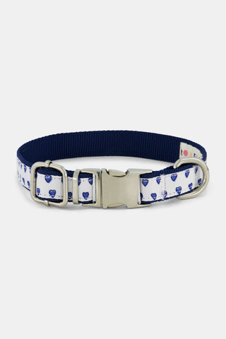 FANFAB Hearts Dog Collar featuring a white webbing strap with a blue heart pattern, navy blue backing, and silver-toned metal hardware.