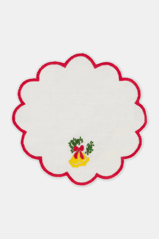 Seasons Soiree Scallop Cocktail Napkin Set Of 4: four round 100 linen napkins with scalloped red edges, each featuring a different embroidered Christmas icon: a tree, holly, a candy cane, and bells.