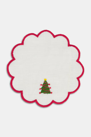 Seasons Soiree Scallop Cocktail Napkin Set Of 4: four round 100 linen napkins with scalloped red edges, each featuring a different embroidered Christmas icon: a tree, holly, a candy cane, and bells.