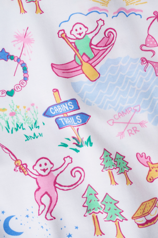 The Camp RR Polo Pajamas by Roller Rabbit feature a colorful illustration of pink monkeys in classic-cut pajamas—canoeing, vine-swinging, and surrounded by trees, flowers, a deer, a Cabins/Trails signpost, and a whimsical lakeside scene.