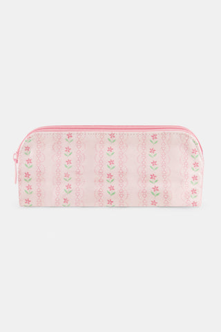 The Daisy Heart Stripe Makeup Bag by Roller Rabbit is a pink cotton canvas cosmetic pouch with a zipper, adorned with a delicate pattern of pink lines and small green and pink floral motifs on a light background.