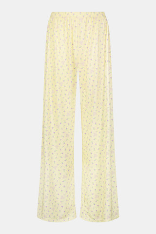 Yellow wide-leg pajama pants with a small yellow floral print pattern, crafted from a soft cotton modal blend, shown on a white background. These comfortable Roller Rabbit Mini Monkey Blossom Monroe Pants are perfect for relaxing at home.