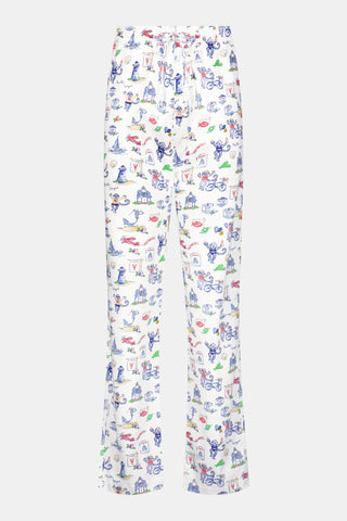 Crafted from soft Pima cotton, the Roller Rabbit Monkey On The Vineyard Long Sleeve Polo Pajamas feature a button-up long-sleeve top and long pants adorned with the playful Monkey on the Vineyard print, showcasing various animals, objects, and buildings on a plain white background.