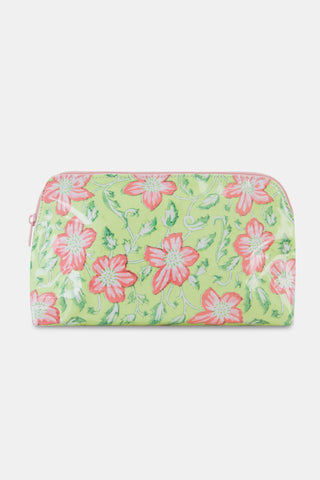 Introducing the Verdant Floral Makeup Bag by Roller Rabbit—a rectangular zippered pouch crafted from cotton canvas, featuring a lush green background adorned with large pink flowers and leafy accents. Water-resistant and stylish, this practical cosmetic bag is perfect for daily use.