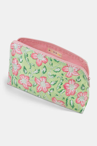 Introducing the Verdant Floral Makeup Bag by Roller Rabbit—a rectangular zippered pouch crafted from cotton canvas, featuring a lush green background adorned with large pink flowers and leafy accents. Water-resistant and stylish, this practical cosmetic bag is perfect for daily use.