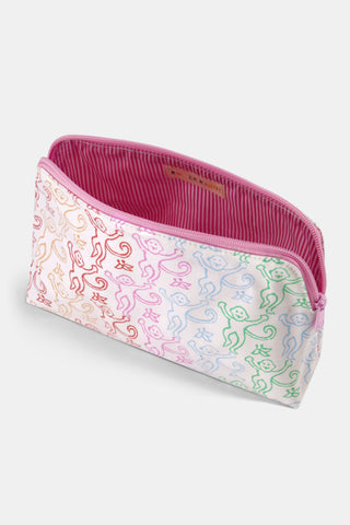 The Disco Monkey Makeup Bag by Roller Rabbit is a white cotton canvas pouch with a water-resistant finish, featuring a playful pattern of green, blue, pink, and red smiling monkeys with curly tails.