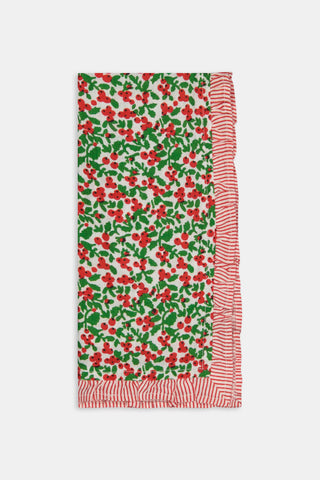 A Holly Berry Napkin Set Of 4 featuring a red berry and green leaf pattern with red-and-white striped borders.