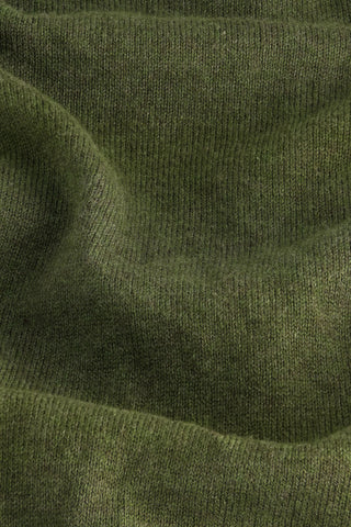 The Roller Rabbit Laine Cardigan is an olive green women's long-sleeve pima cotton cardigan with a round neckline, ribbed cuffs and hem, and two front pockets, shown on a plain white background.