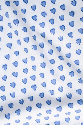 The Roller Rabbit Mens Hearts Simon Pant features white pajama pants with a blue dotted pattern, a drawstring waistband, and wide legs, displayed on a plain white background.