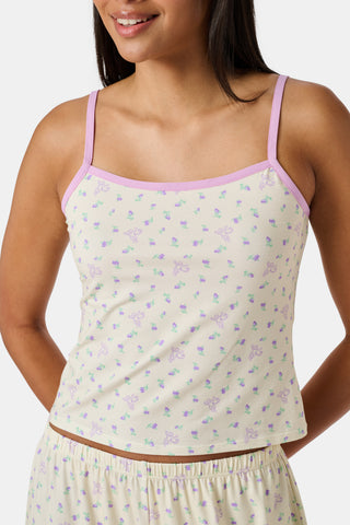 Yellow wide-leg pajama pants with a small yellow floral print pattern, crafted from a soft cotton modal blend, shown on a white background. These comfortable Roller Rabbit Mini Monkey Blossom Monroe Pants are perfect for relaxing at home.