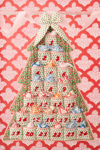 SAPPHIRE Holly Berry Advent Calendar: a tree-shaped 100 cotton calendar with numbered pockets from 1 to 24 and red embroidery.
