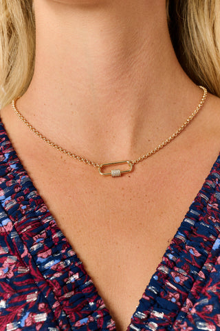 MADISON 501 Pave Carabiner Necklace featuring a gold-tone link chain with a rectangular pavé carabiner pendant and a row of embedded crystals.
