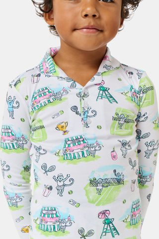 The Roller Rabbit Kids Game, Set, Monkey Parker Polo Pajamas feature a playful print of mice, tents, and trees on a white background. Made from soft pima cotton, this pajama set includes a long-sleeve button-up top and matching pants for children.