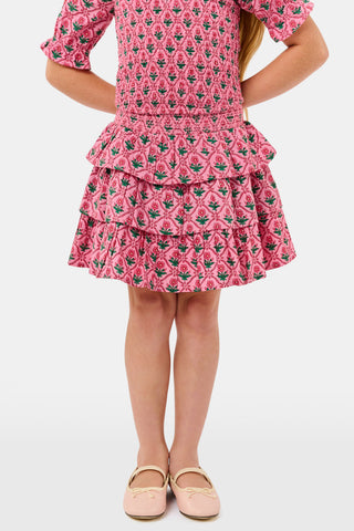 Kids Mia Floral Sami Skirt, a matching pink floral crop top and ruffled mini skirt with a smocked waistband.