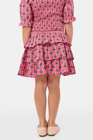 Kids Mia Floral Sami Skirt, a matching pink floral crop top and ruffled mini skirt with a smocked waistband.