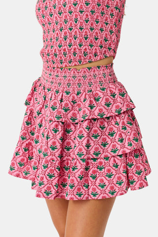 Kids Mia Floral Sami Skirt, a matching pink floral crop top and ruffled mini skirt with a smocked waistband.