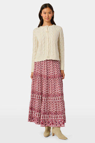 A long, tiered burgundy ornate paisley SAPPHIRE Ornate Paisley Carlisa Skirt worn with tan ankle boots.
