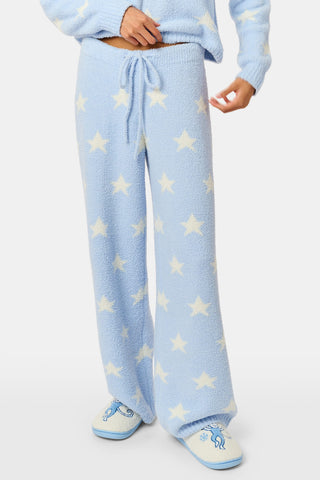 Stars Lettie Pant light blue plush loungewear pants featuring a white star print and a drawstring waistband.