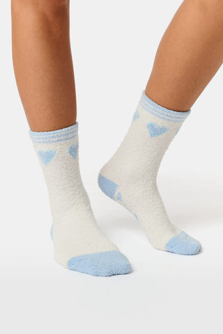BETTEX Hearts Slipper Socks, white plush with blue heart patterns and matching blue heels and toes.