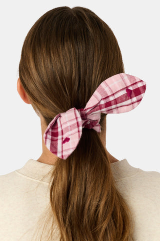 SAPPHIRE Plaid Hearts Bow Scrunchie in red and white with two hanging tails and small heart patterns.