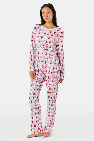 The Alpha Phi Monkey Pajamas by Roller Rabbit are a long-sleeve pajama set crafted from soft Pima cotton, featuring a red and gray cartoon animal print on a white background, with a Henley top and matching pants.