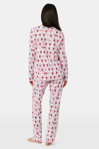 The Alpha Phi Monkey Pajamas by Roller Rabbit are a long-sleeve pajama set crafted from soft Pima cotton, featuring a red and gray cartoon animal print on a white background, with a Henley top and matching pants.