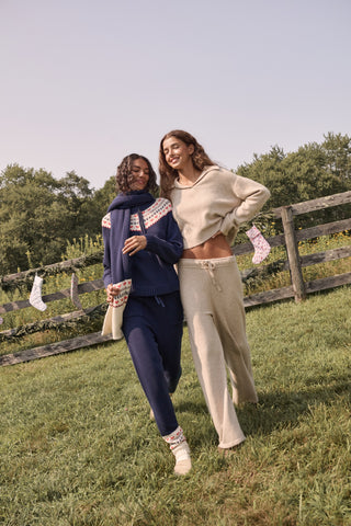 AFFINA Olivia Pant in beige cashmere blend, featuring a flare-leg silhouette, wide-leg fit, and an elastic drawstring waist.