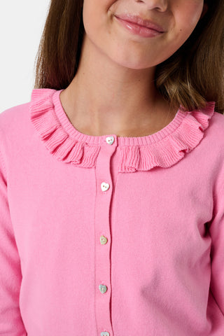 The Kids Ellis Cardigan by Roller Rabbit is a rose pink, long-sleeve cardigan featuring a ruffled collar and pearl-like buttons. Shown flat on a white background, it's made from soft cotton sweater material.