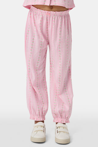 The Kids Daisy Heart Stripe Lucy Pants by Roller Rabbit are crafted from soft Pima cotton genie pant fabric in rose pink, featuring an elastic waistband and cuffs, with a subtle striped pattern and small floral designs throughout—making them a charming addition to girls' fashion.