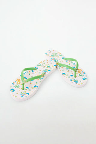 The Pool Party Flip Flops are white sandals with green, colorful straps and a fun animal and nature pattern on the soles, shown against a plain white background—ideal for summer style.