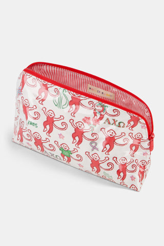 The Alpha Chi Omega Monkey Makeup Bag by Roller Rabbit is a white zippered pouch with a red trim, featuring playful red monkeys holding green and blue Greek letters and symbols—ideal as a makeup bag or sisterhood gift for A Chi O members.