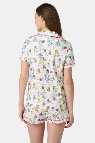 Celebrate in style with the Birthday Bonanza Long Sleeve Polo Pajamas, featuring playful monkeys, elephants, and whales in party hats among cakes, cupcakes, presents, balloons, crowns, hearts & confetti—festive cotton PJs for birthdays!.