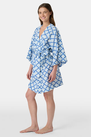 The Jemina Lulu Set features a repeating blue and white scallop pattern filled with delicate floral and leaf motifs, creating a textured effect reminiscent of traditional Jemina blue print—perfect for cozy PJ or short sets.