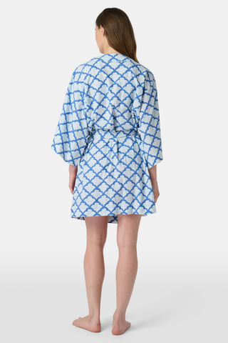 The Jemina Lulu Set features a repeating blue and white scallop pattern filled with delicate floral and leaf motifs, creating a textured effect reminiscent of traditional Jemina blue print—perfect for cozy PJ or short sets.