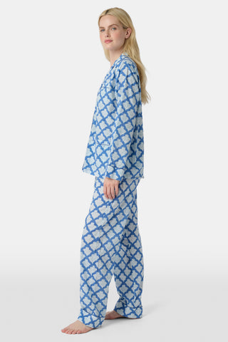 The Jemina Lulu Set features a repeating blue and white scallop pattern filled with delicate floral and leaf motifs, creating a textured effect reminiscent of traditional Jemina blue print—perfect for cozy PJ or short sets.