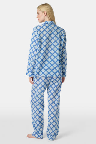 The Jemina Lulu Set features a repeating blue and white scallop pattern filled with delicate floral and leaf motifs, creating a textured effect reminiscent of traditional Jemina blue print—perfect for cozy PJ or short sets.