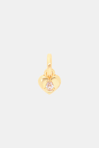 MADISON 501 Gem Heart Charm featuring a gold heart-shaped charm with a small, pear-shaped clear stone at the center and a circular jump ring at the top.
